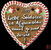 Cartoon: Lebkuchenherz (small) by Dadaphil tagged oktoberfest,lebkuchen,soldaten,afghanistan