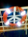 Cartoon: Peace symbol or a life jacket? (small) by Kostis tagged sea peace symbol life jacket ship wind salt