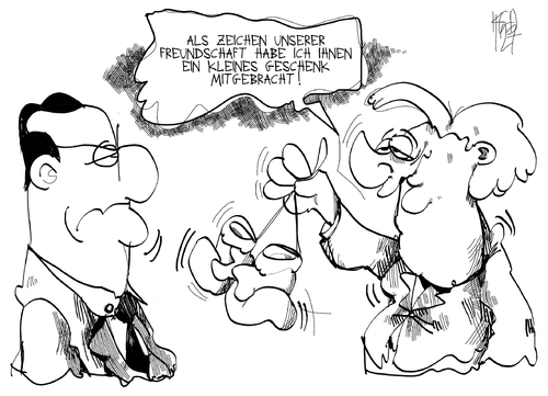 Cartoon: Deutschland-Frankreich (medium) by Kostas Koufogiorgos tagged deutschland,frankreich,merkel,hollande,freundschaft,europa,geschenk,karikatur,kostas,koufogiorgos,deutschland,frankreich,merkel,hollande