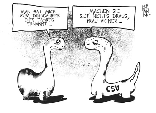 Cartoon: Dinosaurier (medium) by Kostas Koufogiorgos tagged csu,dinosaurier,aigner,verbraucherschutz,ministerin,politik,auszeichnung,preis,karikatur,kostas,koufogiorgos,csu,dinosaurier,aigner,verbraucherschutz,ministerin,politik,auszeichnung,preis,karikatur,kostas,koufogiorgos